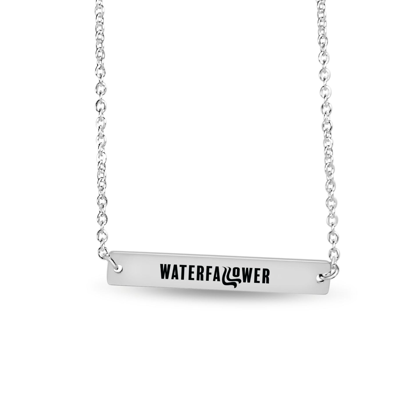 Silver necklace with a bar pendant engraved 'WATERFALLFLOWER' on a white background